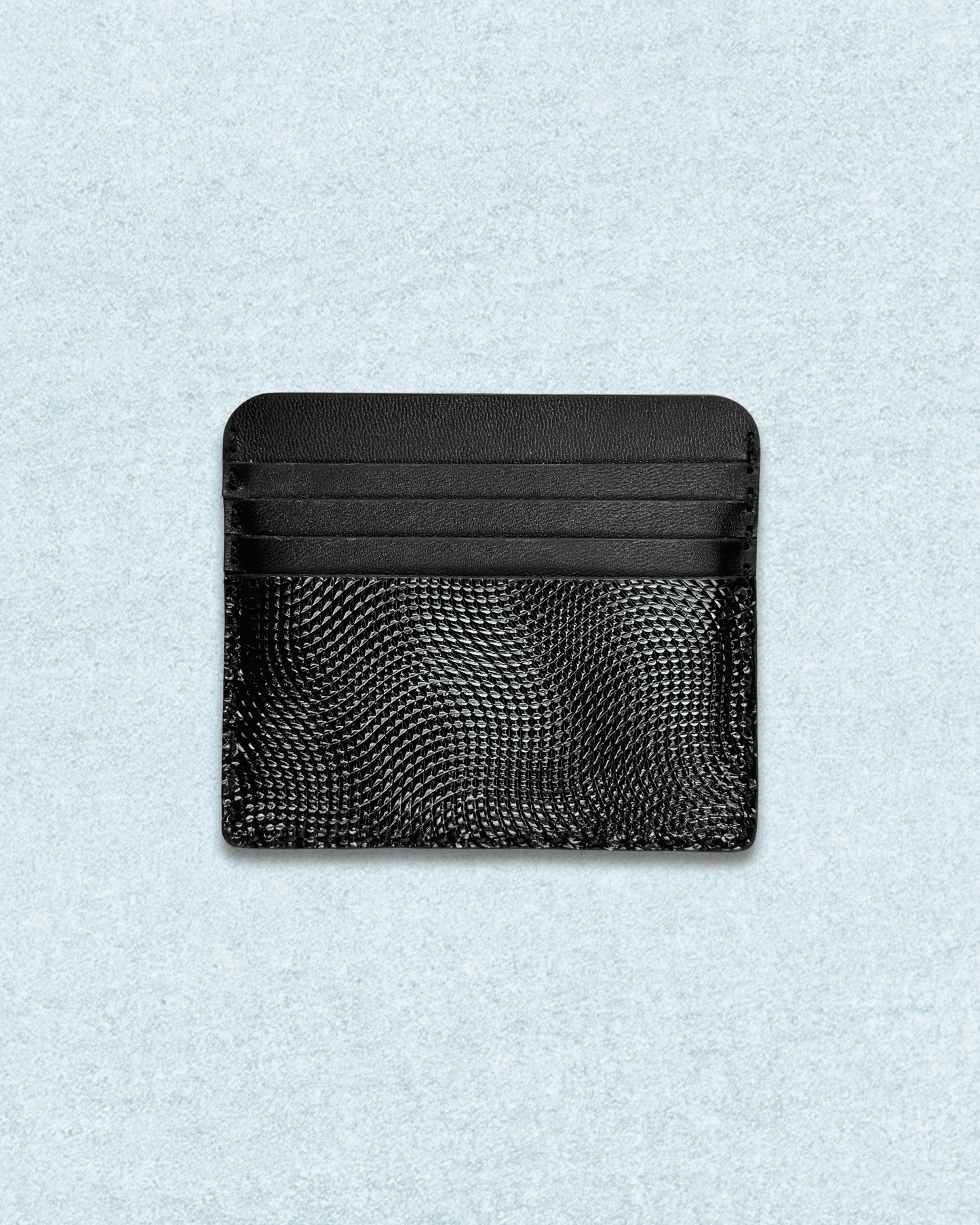 Back side of Black Dotted pattern embossed Card Holder with 8 card slots and 1 cash pocket. made with original Cow Leather, Hand stitched and Hand Crafted