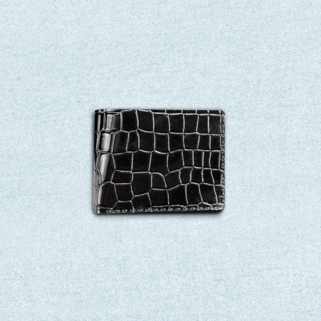 Dark Croco black cowhide leather wallet (closed) – hand-stitched men’s bifold wallet with Black crocodile texture.