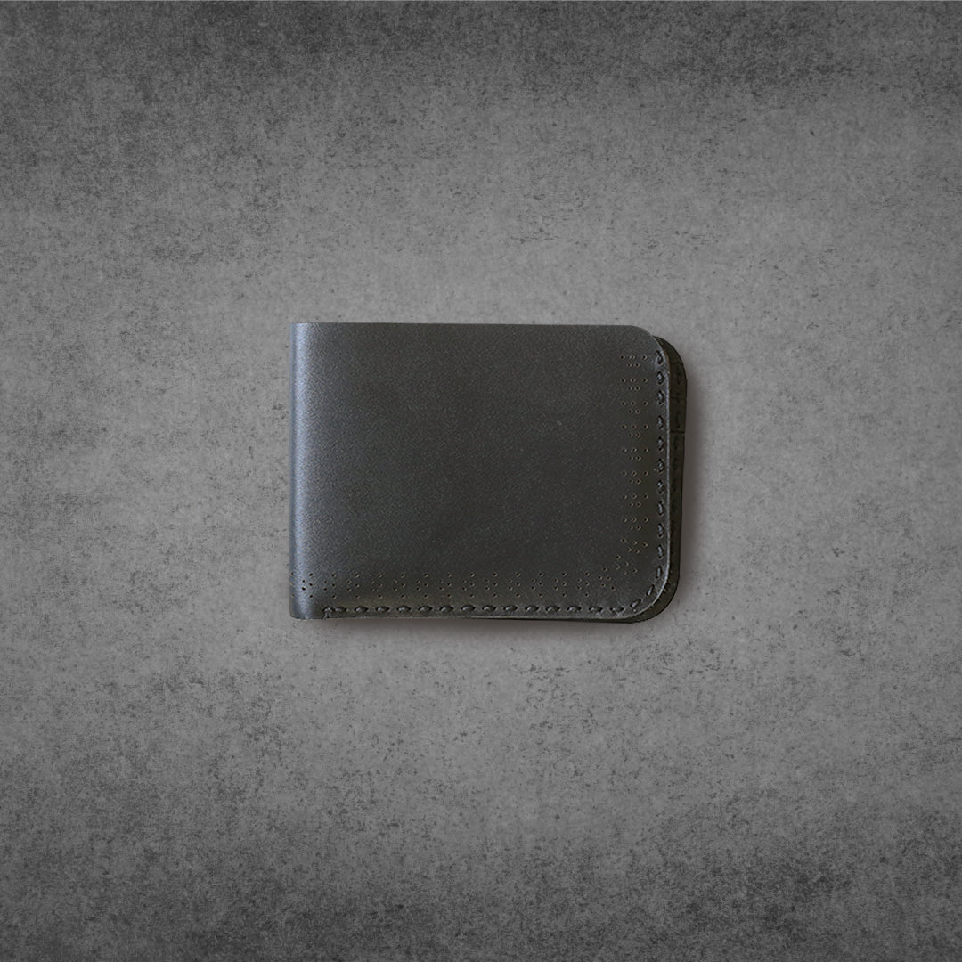 Black Perforated Cow Leather brogue style bi-fold wallet, fashion, luxury, hand stitched, hand craft, 6 card slots, 2 Cash pockets
Product code: 0089
Hand-stitched
Leather: cow leather
Color: Black
Thread: Black
2 cash slots and 6 card pockets
Dimensions: 11cm x 08cm