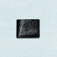 Dark Python Black Wallet – men’s hand-stitched black cow-leather bifold with embossed python texture
Men’s black leather bifold wallet with python-pattern texture, hand-stitched, 8 card slots and 1 cash slot – for men in Pakistan.