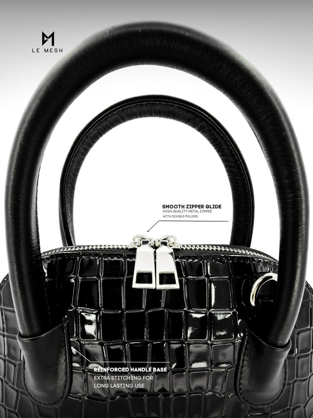 Black handbag with detailed text on features against a white background