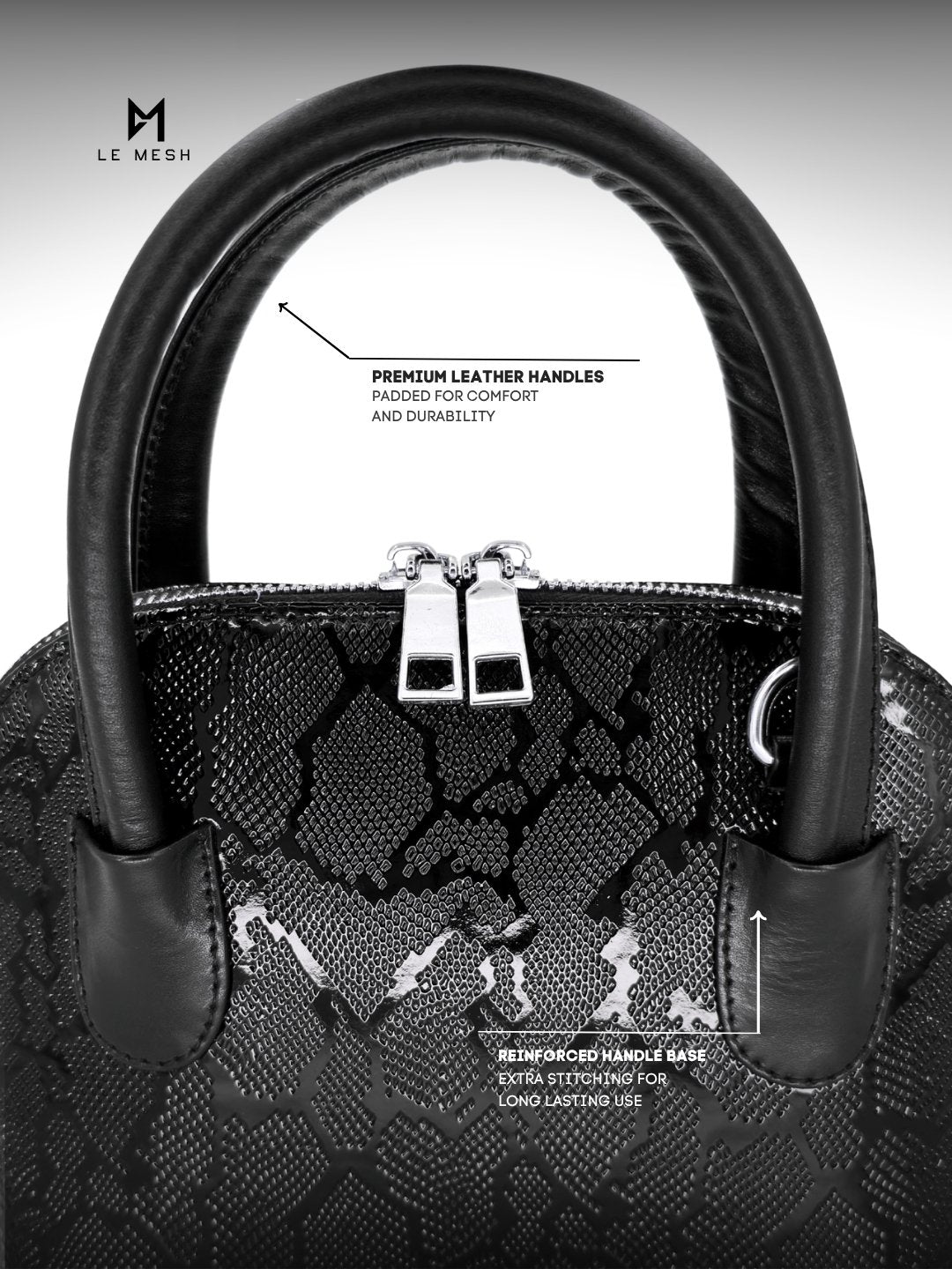 Black handbag with detailed text on leather handles and stitching quality.